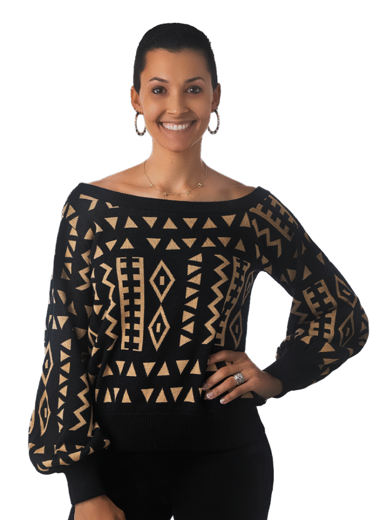 Woman with black and gold sweater and a short pixie cut